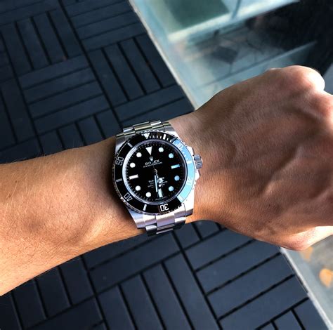 rolex submariner wrist shot|rolex 114060 vs 124060.